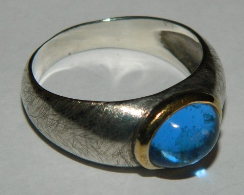 Silver ring with blue stones