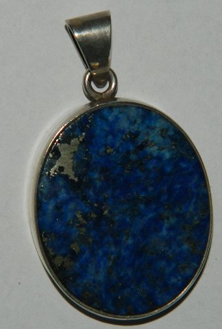 N. E. From Sterling silver pendant with lapis lazuli