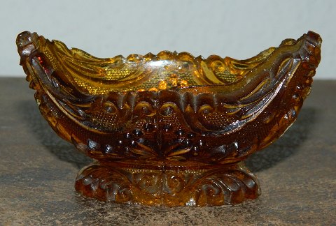 Brown salt bowl in pressed glass 19th. century