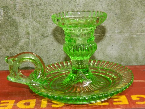 Candlestick in green glass from Funen Glassworks