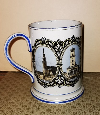 Aluminia faiance mug with motifs from Copenhagen 19th. century