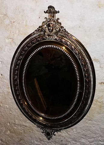 Antique mirror in copper