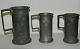 Old mugs in pewter Buntzen