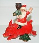 Julepynt -Gammel figur af julemand på gris - som lyseholder
