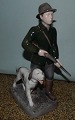 B&G porcelain figure of hunter with his hunting dog