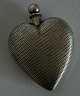Heart of silver in the form of perfume flacon