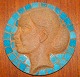 Portrait of woman on the plate in ceramics