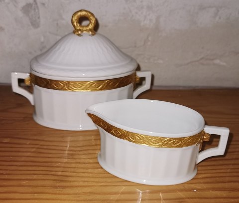 Guld vifte sukker -og flødesæt i porcelæn fra Royal Copenhagen