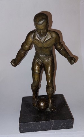 Figur i bronze af fodboldspiller