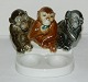 Pibeholder i form af porcelænsfigur med aber
