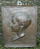 Relief i bronze af Johan Gudmundsen-Holmgreen i 1904.